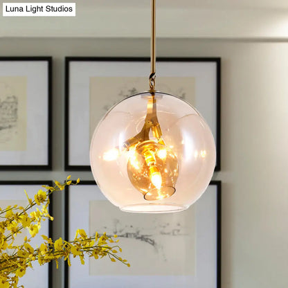 Lámpara de araña moderna de cristal ámbar/transparente para comedor con tres luces.