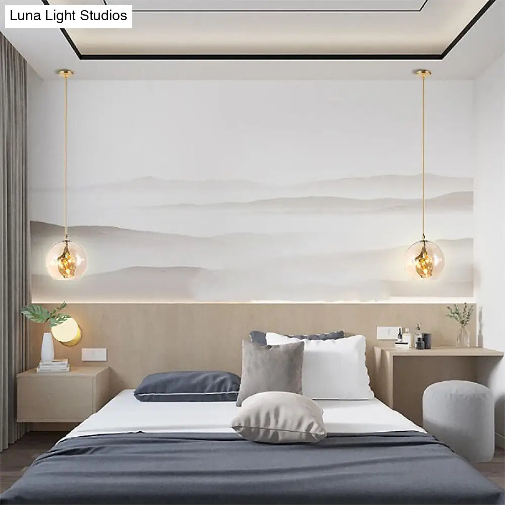 Lámpara de araña moderna de cristal ámbar/transparente para comedor con tres luces.