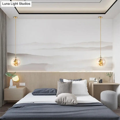 Lámpara de araña moderna de cristal ámbar/transparente para comedor con tres luces.