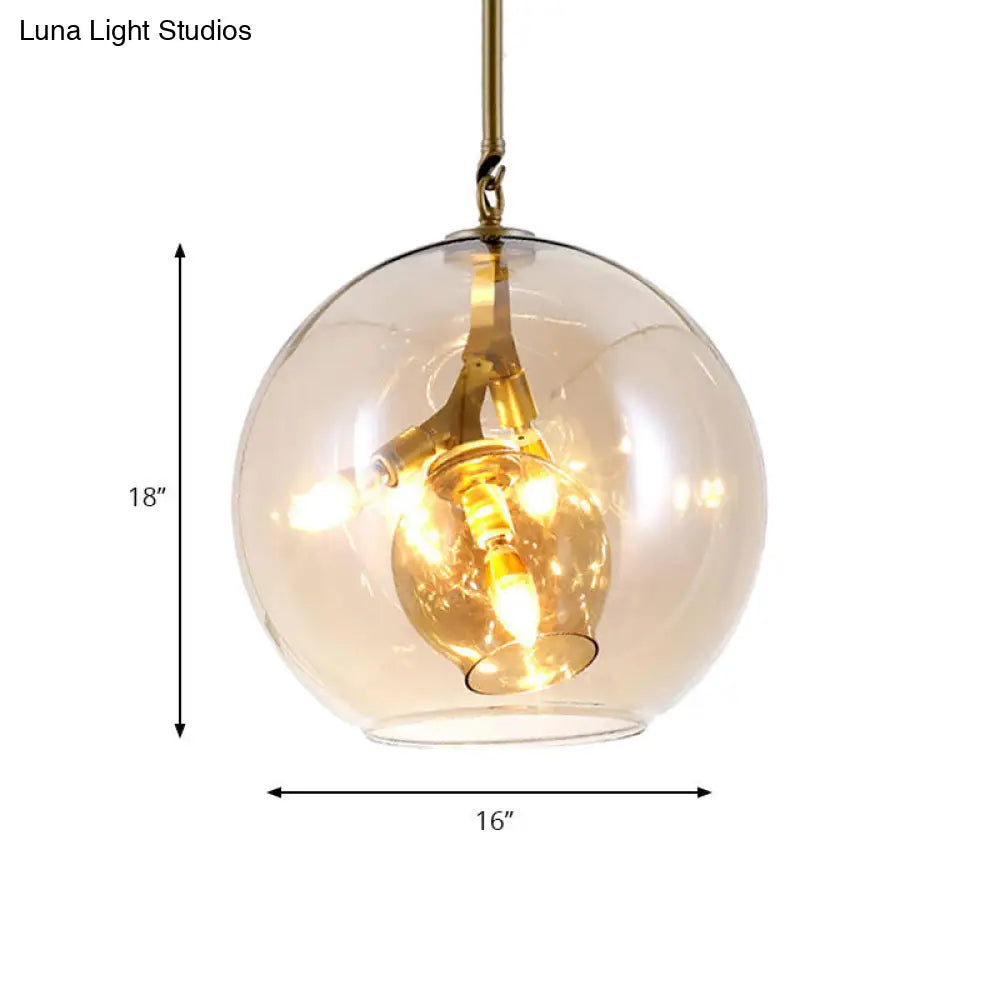 Lámpara de araña moderna de cristal ámbar/transparente para comedor con tres luces.