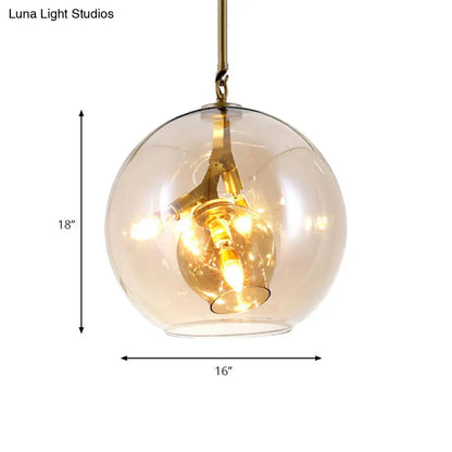 Lámpara de araña moderna de cristal ámbar/transparente para comedor con tres luces.