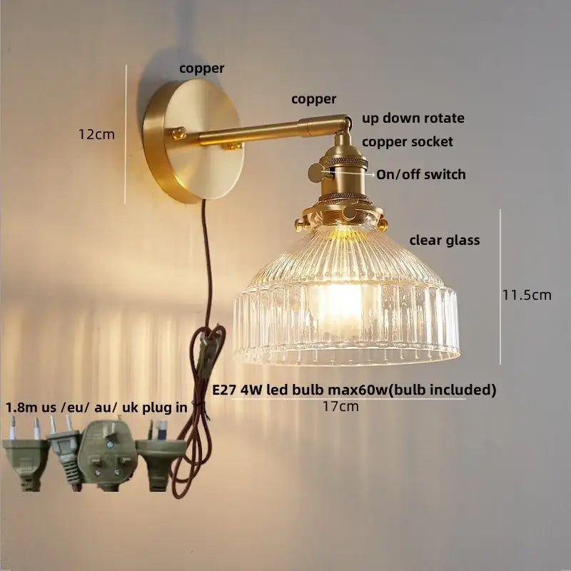 Vintage-style brass wall sconce with a clear ribbed glass shade for modern amber clear glass decorbites wall sconce