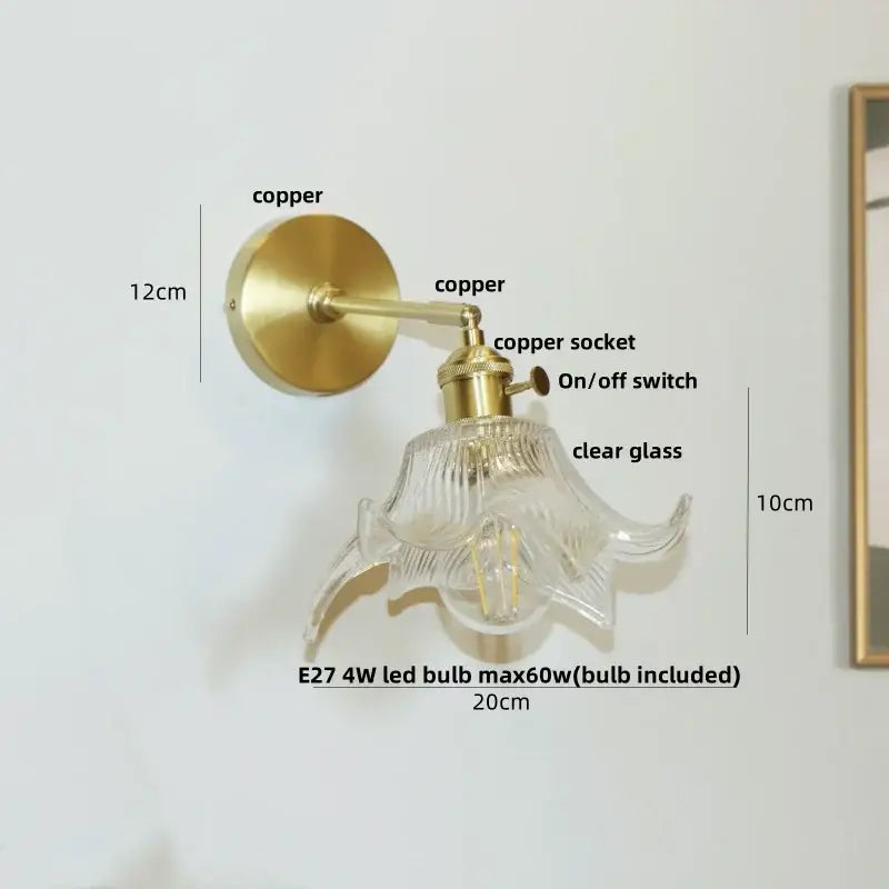 Modern amber clear glass wall sconce with brass copper finish and clear glass flower shade by decorbites clear glass