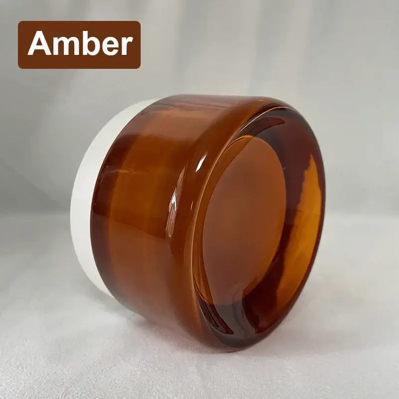 Modern amber and cream glass sconce led wall lamp featuring an amber-colored glass jar with a white lid for living room