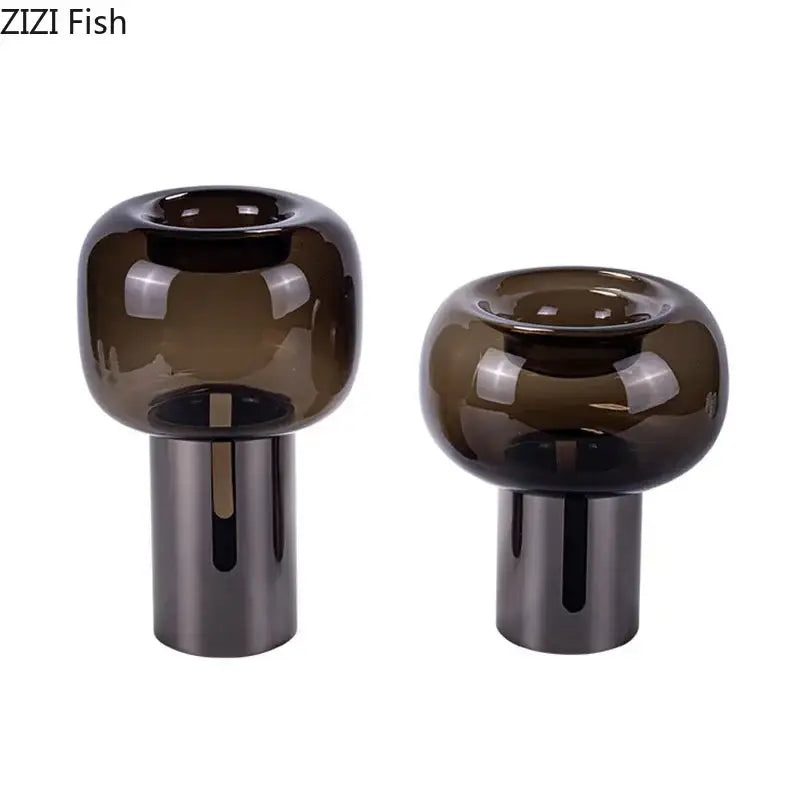 Two sleek dark amber glass vases with cylindrical metallic bases for modern decorbites dark glass office decor