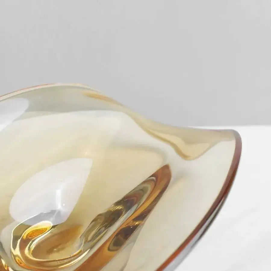 Modern amber geometric glass bowl tray in translucent amber with smooth curves and glossy finish for decorbites geometric glass decor