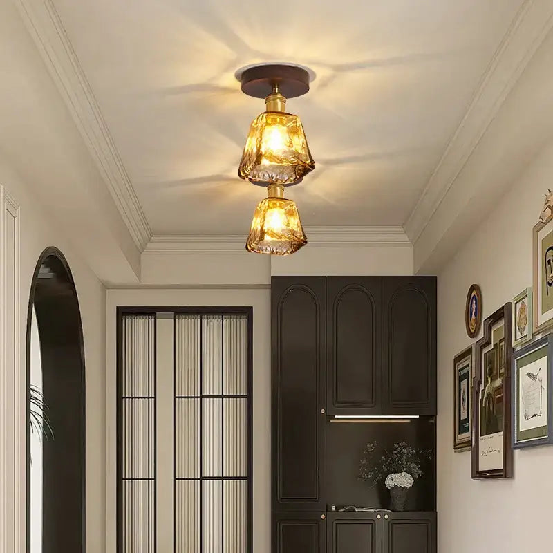 Modern amber glass and brass led ceiling lamp with two stacked textured shades for dining room lighting