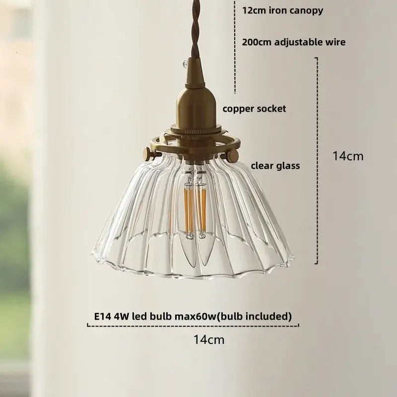 Antique brass-finished pendant light with clear fluted glass shade and e14 led bulb in modern amber glass ball style