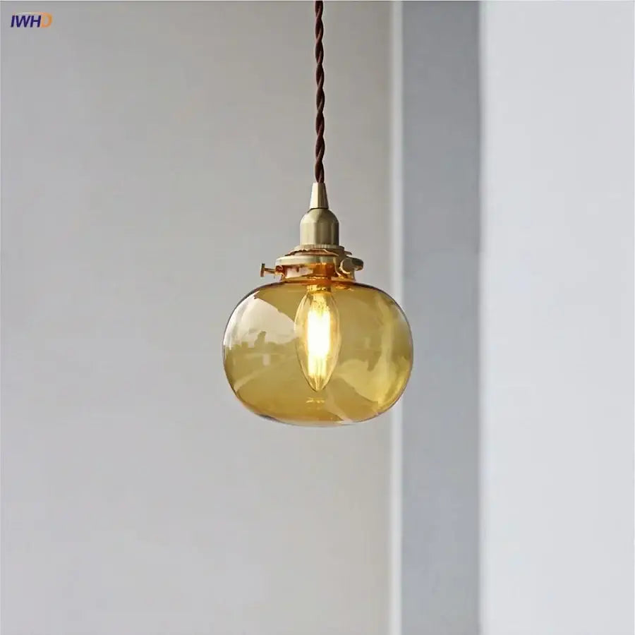 Modern amber glass ball led pendant light with warm amber glass and brass fixture for dining room lighting