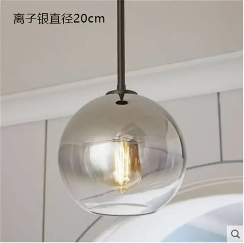 Modern amber glass ball led pendant light with translucent smoked glass globe and exposed filament bulb for decorbites decor