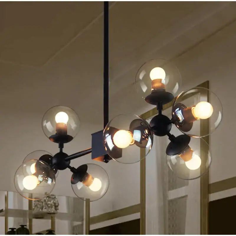 Black metal pendant light with clear glass ball shades and exposed bulbs modern amber glass ball pendant decorbites glass ball