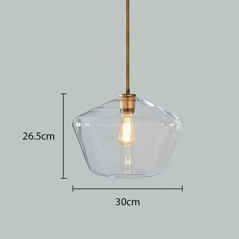 Modern amber glass chandelier with brass pendant light featuring clear glass and exposed filament bulb for living room