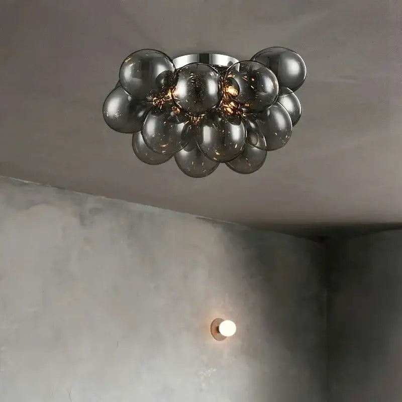 Modern ceiling lamp featuring translucent gray glass spheres in a spherical formation for bedroom lighting