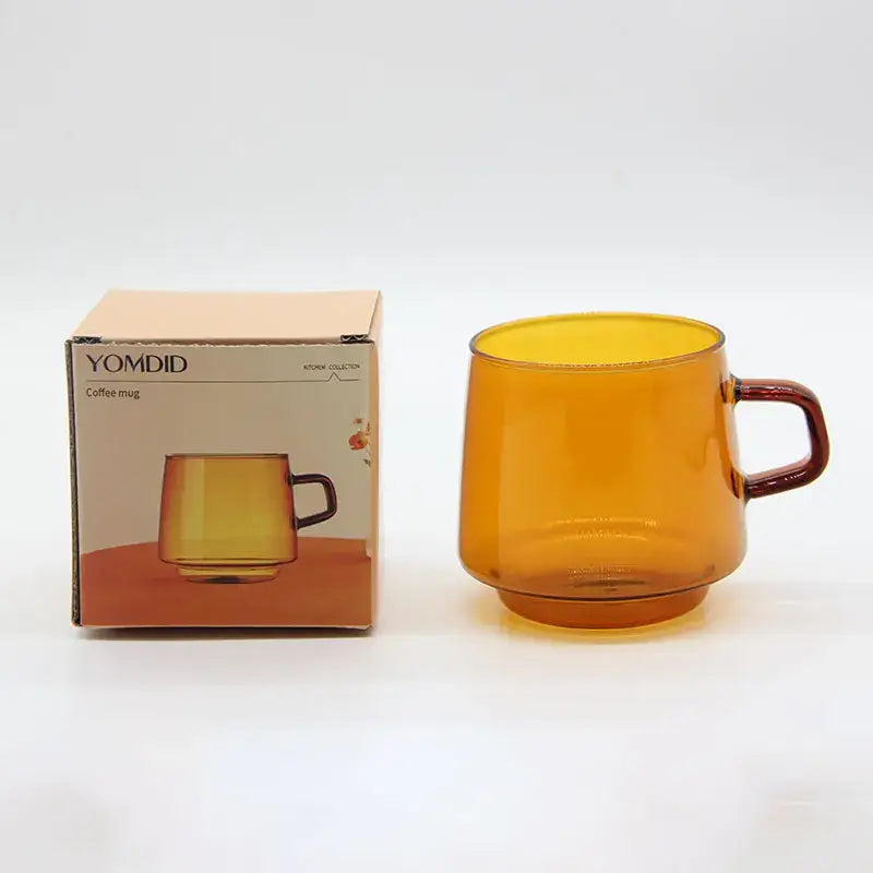 Modern amber glass coffee mug with dark brown handle and black rim from decorbites glass coffee for kitchen use