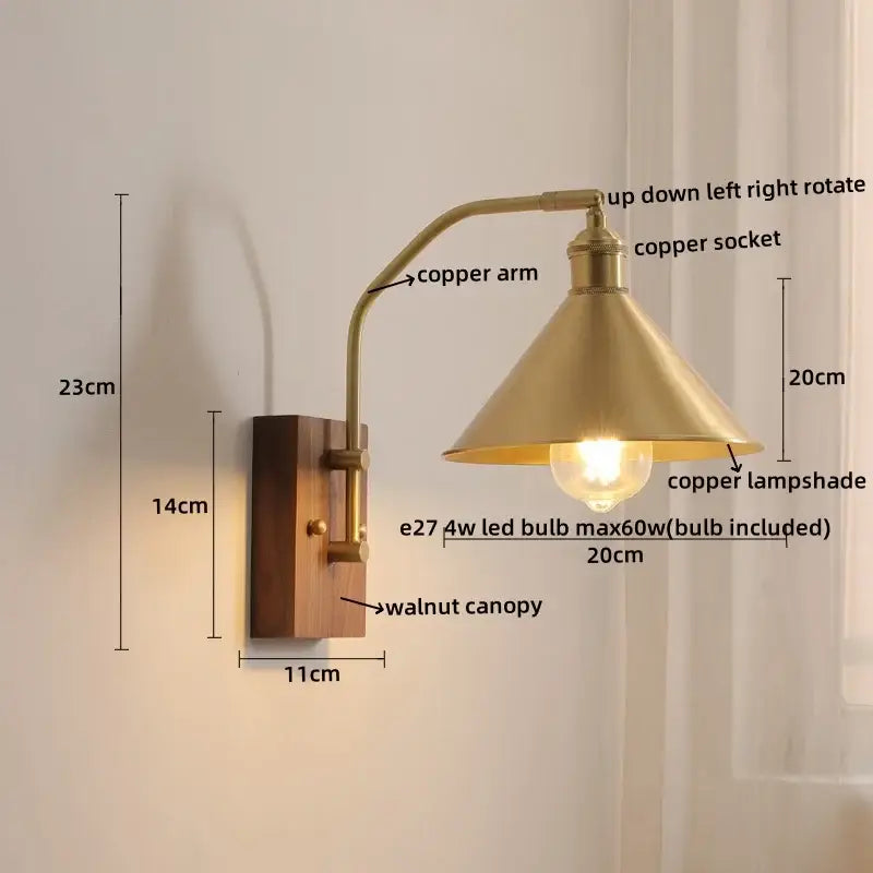 Brass-finished copper led wall lamp with amber glass, walnut canopy, and conical shade for modern bedroom lighting
