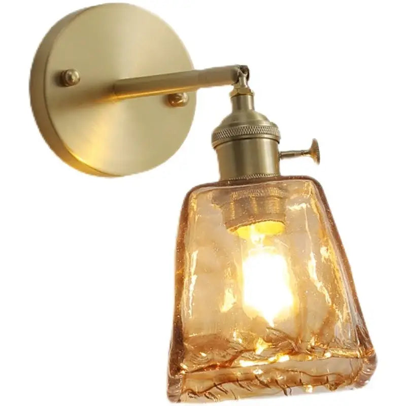 Antique brass wall lamp featuring a textured amber glass copper led shade for modern bedroom sconce lighting