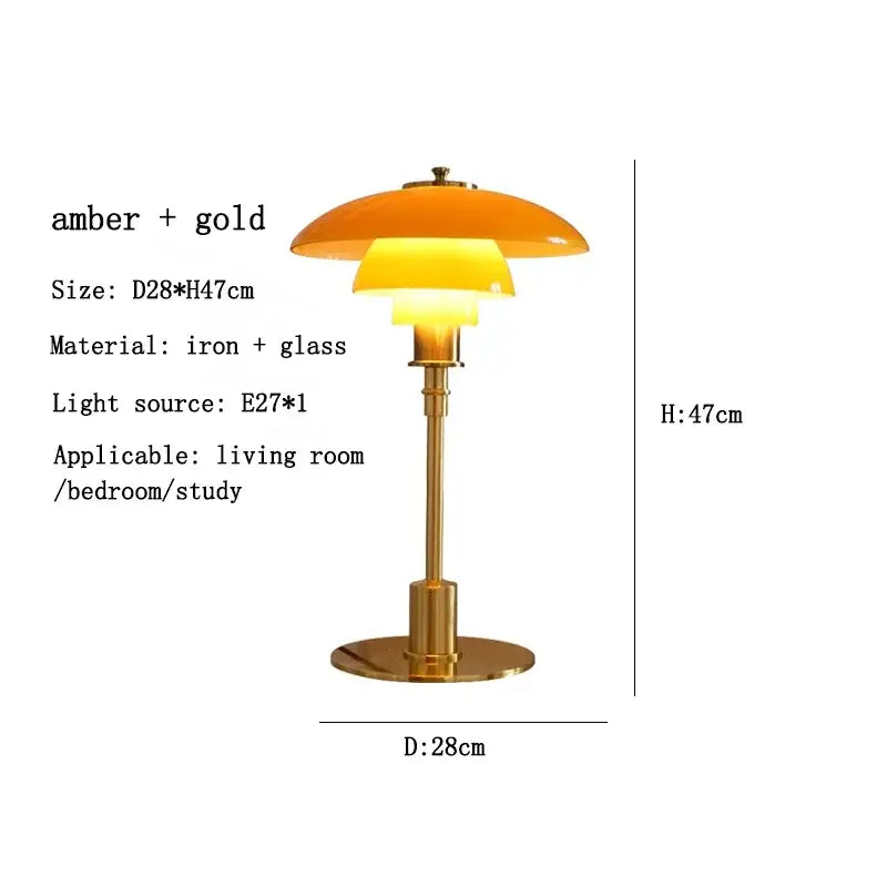 Modern amber glass desk lamp with gold layered shade and sleek brass base ideal for home office decorbites glass desk lamp