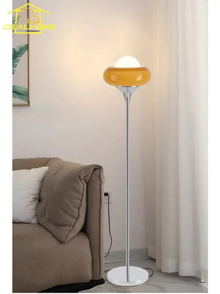 Modern amber glass iron led floor lamp with sleek chrome stem and white base for stylish living room decorbites glass iron