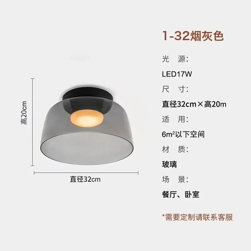 Modern amber glass led ceiling light with smoked glass pendant and black base for dining or bedroom spaces