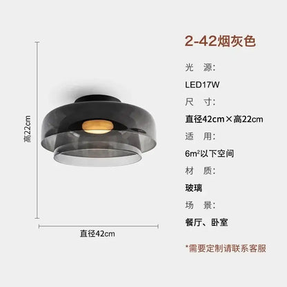 Modern amber glass led ceiling light with a sleek layered smoked glass design for living room illumination