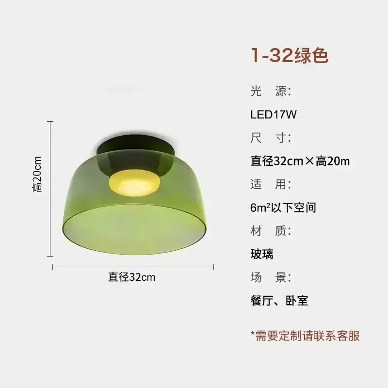 Modern amber glass led ceiling light featuring a translucent green dome with a black base and led bulb for living room