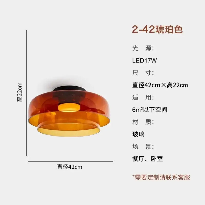 A modern amber glass led ceiling light with a warm glow designed for living room use