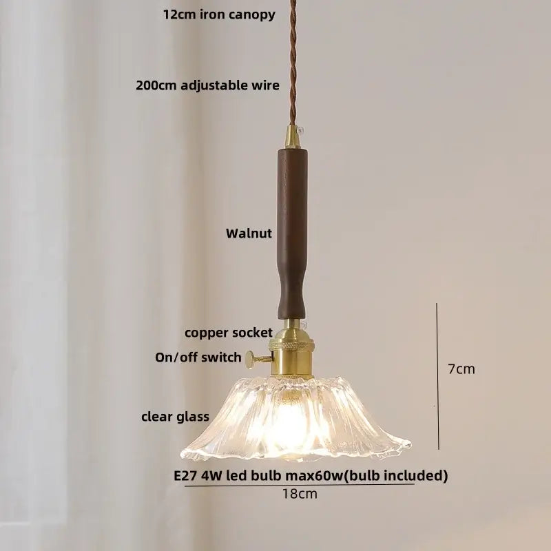 Modern amber glass led pendant light with a fluted clear glass shade and dark walnut wood handle decorbites amber glass decor