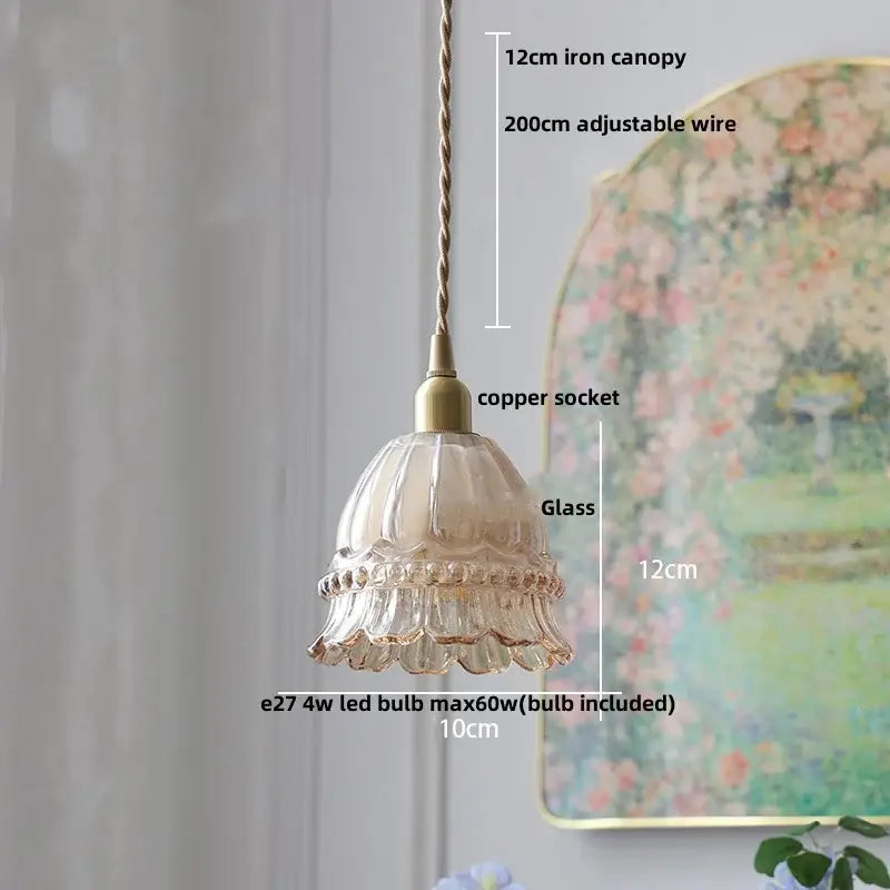 Modern amber glass led pendant light with a delicate fluted scalloped design and gold-toned accents for kitchen use