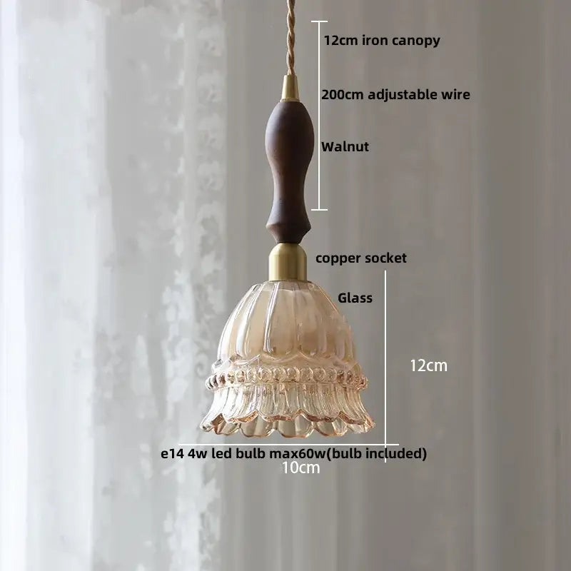 Modern amber glass led pendant light with fluted ruffled design and dark walnut wooden handle for kitchen use