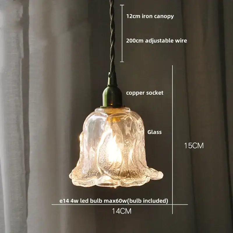 Modern amber glass led pendant light with translucent fluted bell-shaped design and warm amber glow lamp