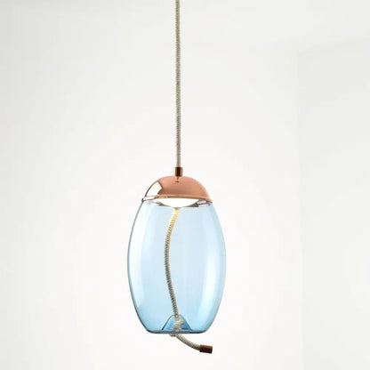 Modern amber glass pendant light with sleek translucent blue brokis knot glass and copper-toned metal accents from decorbites