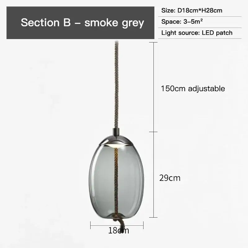Modern amber glass pendant light with smoke grey oval pendant light clear glass shade and led patch light source decorbites brokis knot