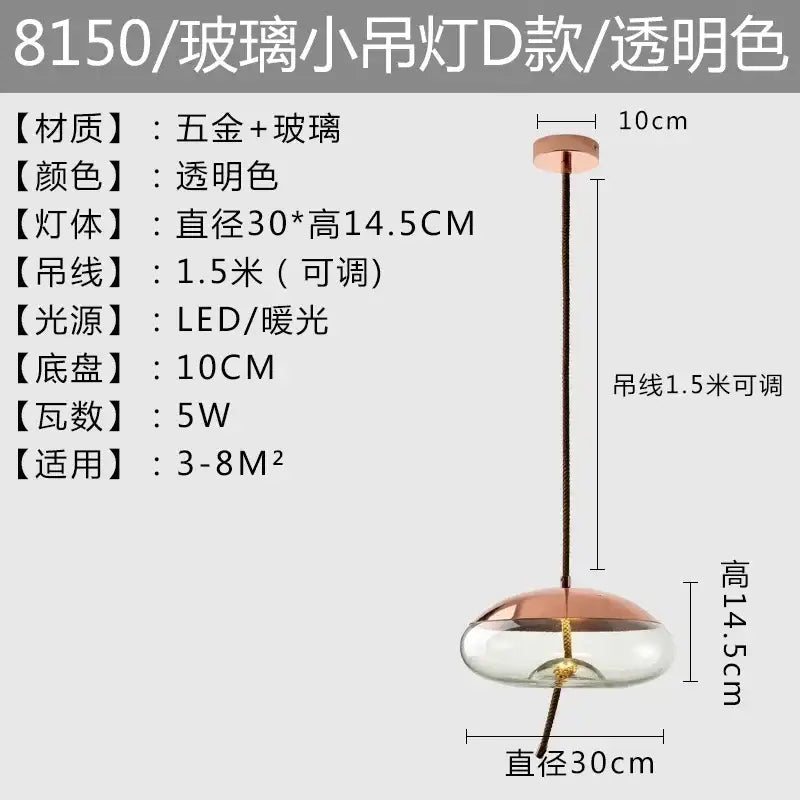 Modern amber glass pendant light with transparent glass and rose gold metal base perfect for bedroom decorbites brokis knot