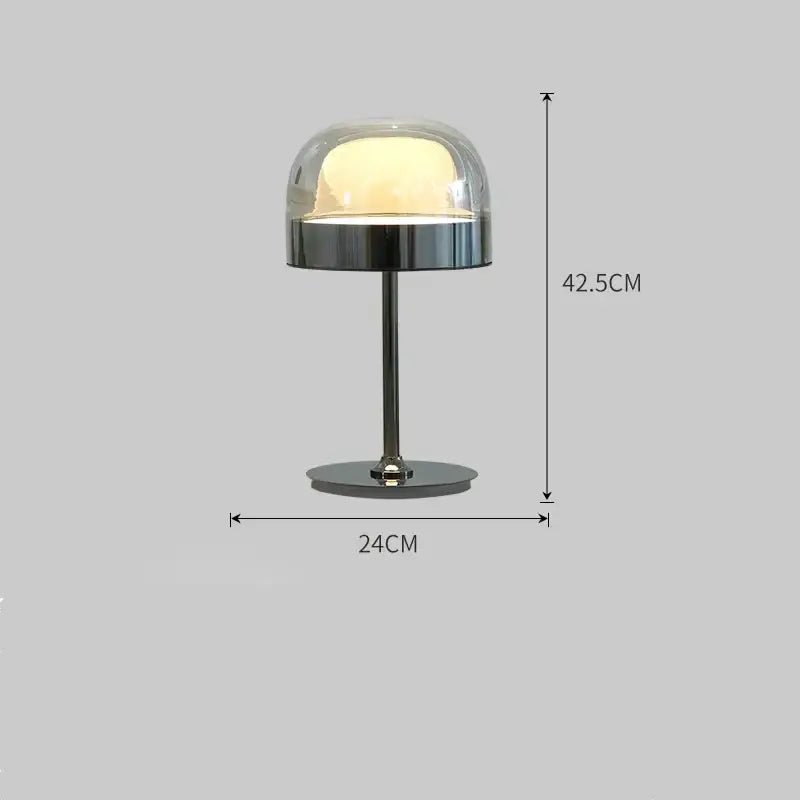 Modern dome-shaped table lamp with clear glass top and polished chrome base complements amber glass pendant light dining room copper finish