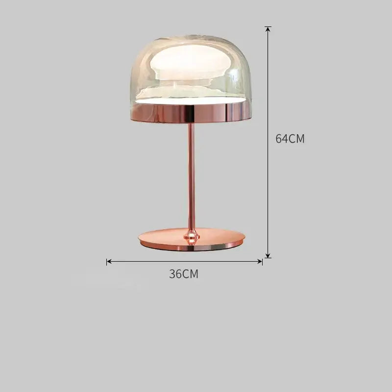 Modern amber glass pendant light with copper finish paired with a rose gold glass pendant light table lamp