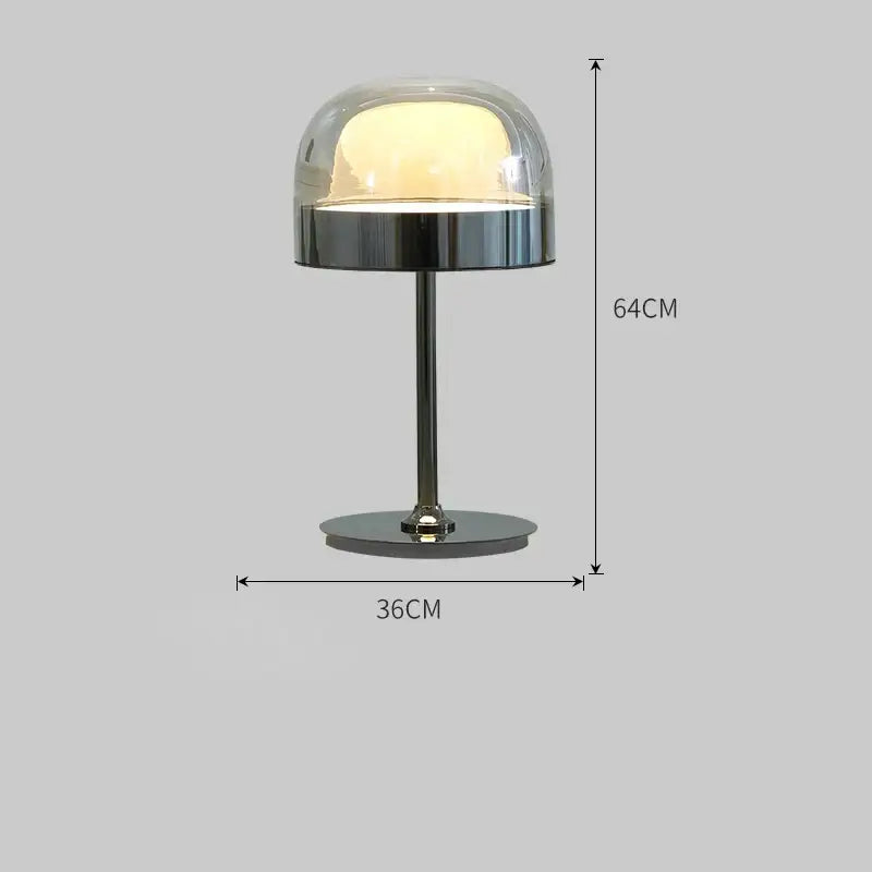 A modern amber glass pendant light with a copper finish featuring a sleek glass dome and polished chrome base