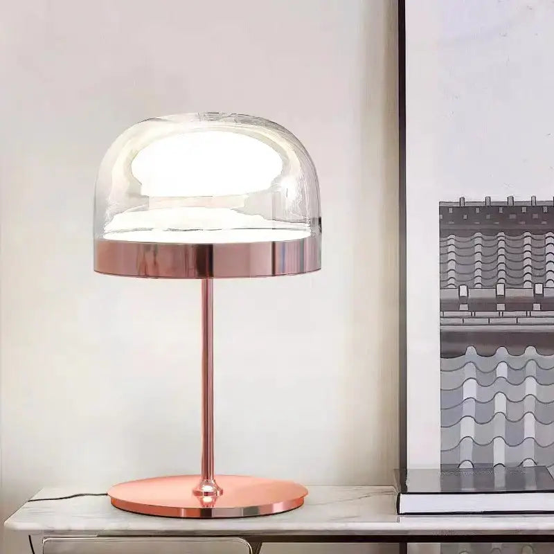 Modern amber glass pendant light with copper finish and rose gold base featuring equatore glass pendant design