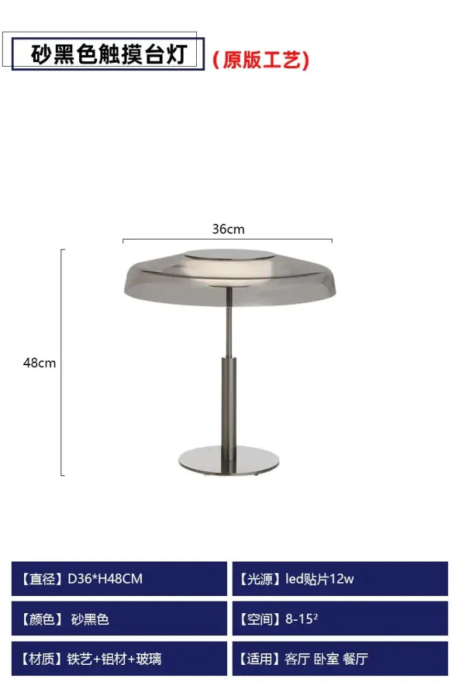 A sleek sand-black decorbites dora glass table lamp with glass top and metal base for modern bedroom decor