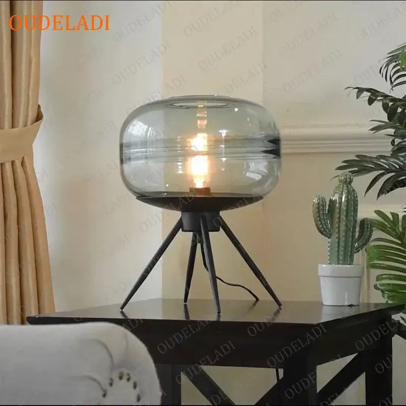 Modern amber glass table lamp with frosted dome and black tripod base ideal for bedroom decorbites glass table lamp