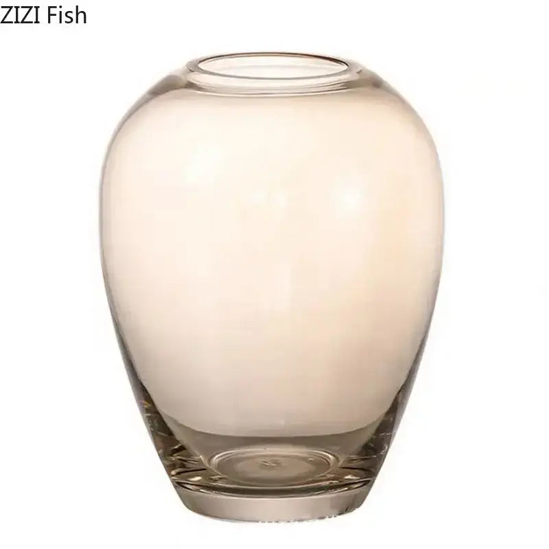 A sleek decorbites amber glass vase with a rounded body and sturdy base, perfect for living room decor