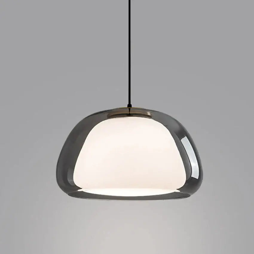 Modern amber and gray double glass pendant light with a sleek dome-shaped glass pendant and chrome finish for dining room