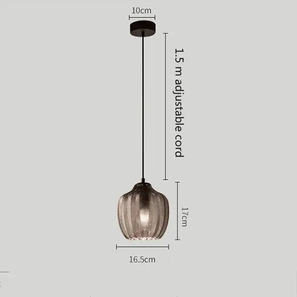 Modern black pendant light with textured ribbed glass shade and adjustable cord decorbites amber gray glass pendant light