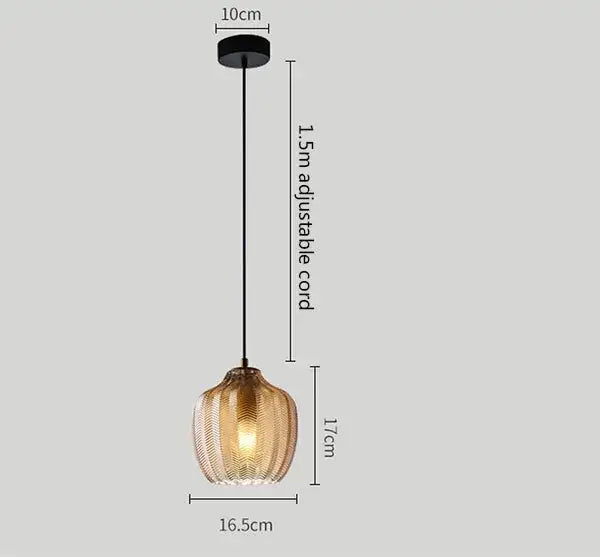 Modern amber gray glass pendant light with wavy texture and black adjustable cord for dining room decorbites amber gray