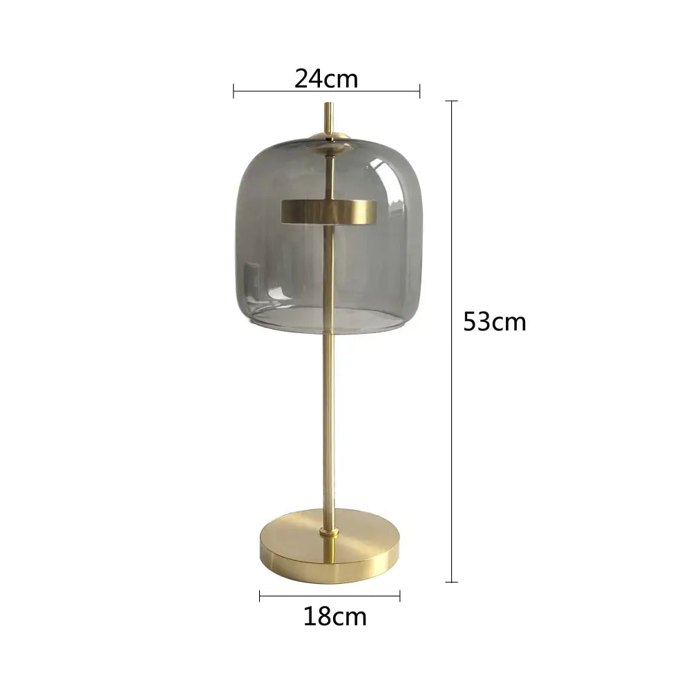 Modern amber and gray decorbites glass table lamp with translucent gray dome and brass metal frame for bedroom decor