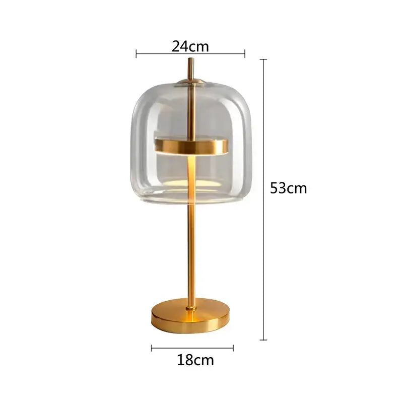 Modern amber and gray decorbites glass table lamp with clear glass dome and gold-toned metal frame for bedroom decor