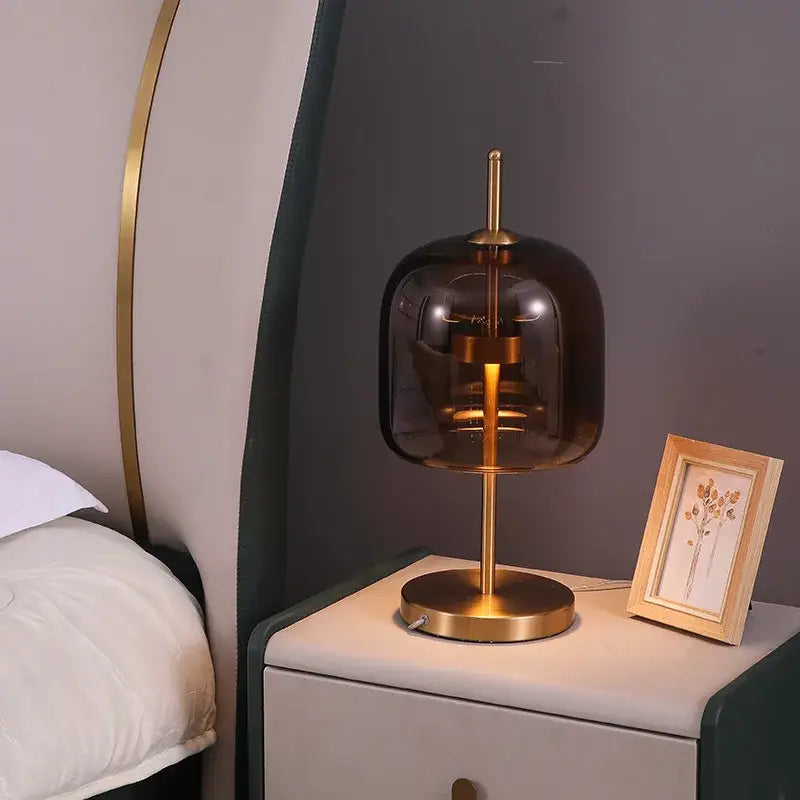 Modern amber and gray decorbites glass table lamp with dark amber glass dome and brass metal base for bedroom decor