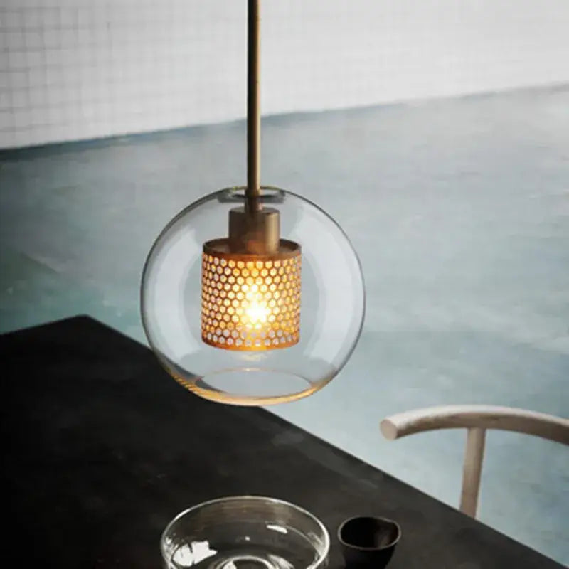 Modern amber honeycomb decorbites glass ball pendant light with clear glass globe and brass rod for kitchen lighting