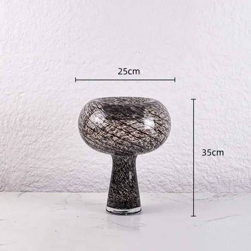 A sleek black glass geometric glass vase with textured swirling pattern, perfect as a modern flower arranger decorbites piece