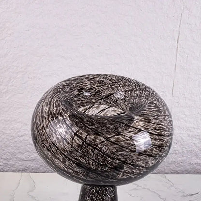 A sleek black and silver geometric glass vase with intricate swirling pattern ideal as a flower arranger decorbites geometric glass decor
