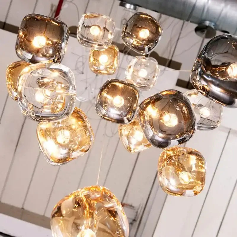 Modern amber and smoke crystal staircase chandelier with translucent glass globe shades for living room lighting
